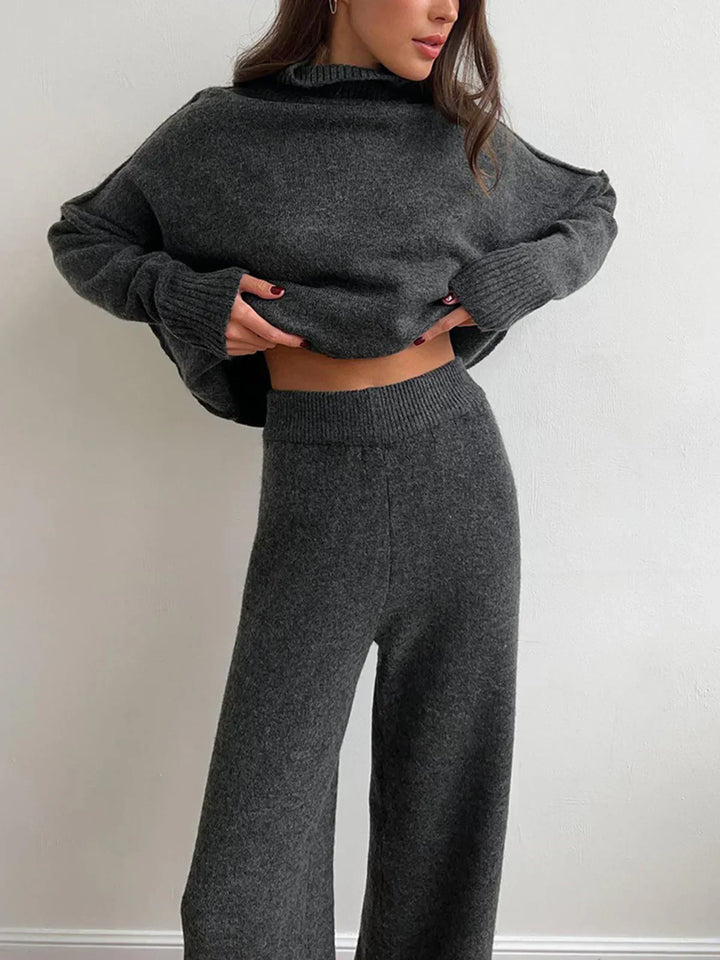 Knitted set with high collar and trousers