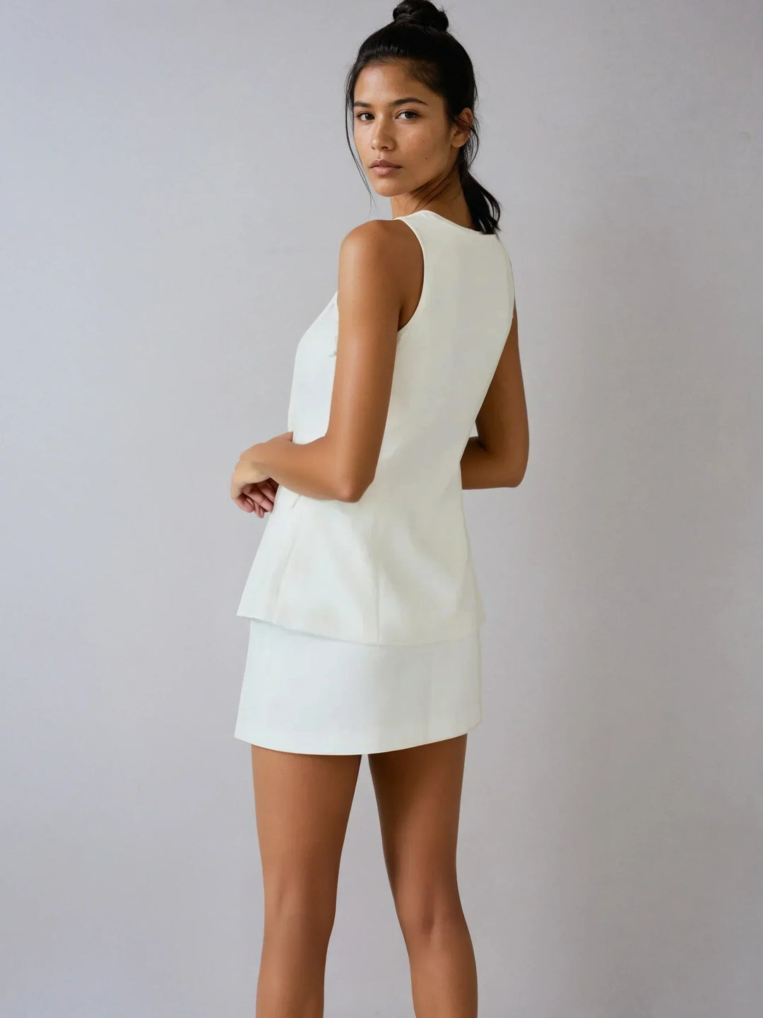 Elegant sleeveless top and skirt set with square collar