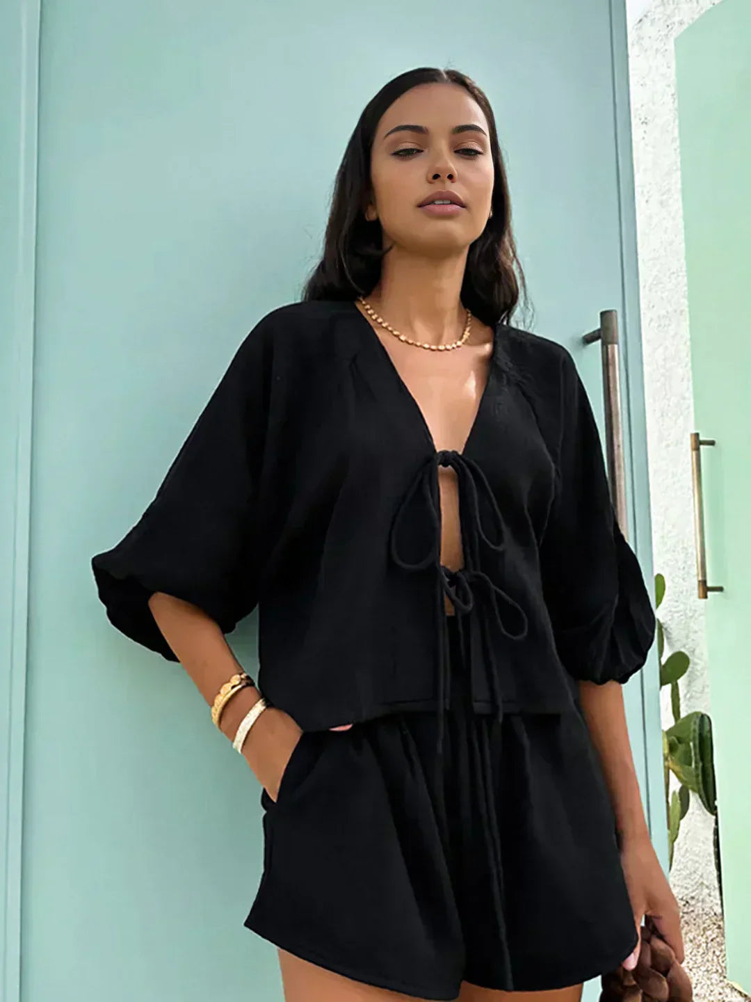 Set of shorts and long-sleeve blouse with bow detail