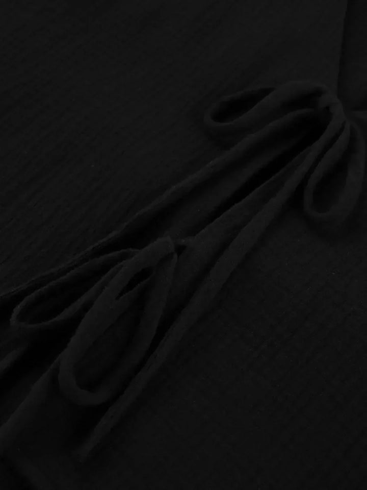 Set of shorts and long-sleeve blouse with bow detail