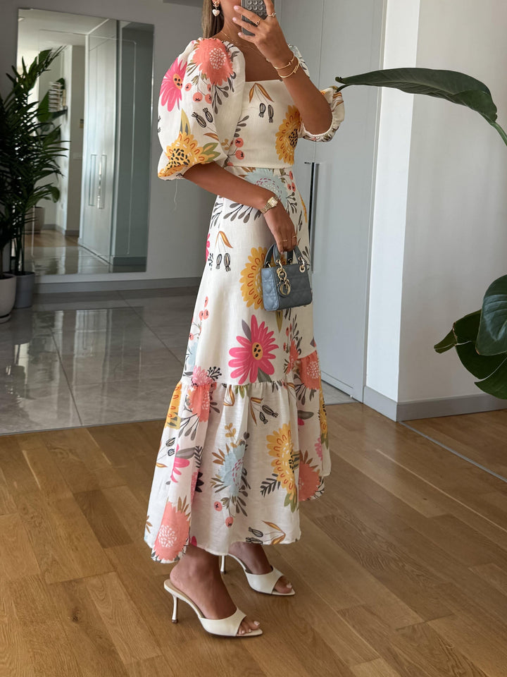 CAMILLE – DRESS WITH PUFFY SLEEVES AND ELEGANCE IN FLOWERS