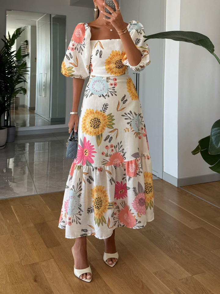 CAMILLE – DRESS WITH PUFFY SLEEVES AND ELEGANCE IN FLOWERS