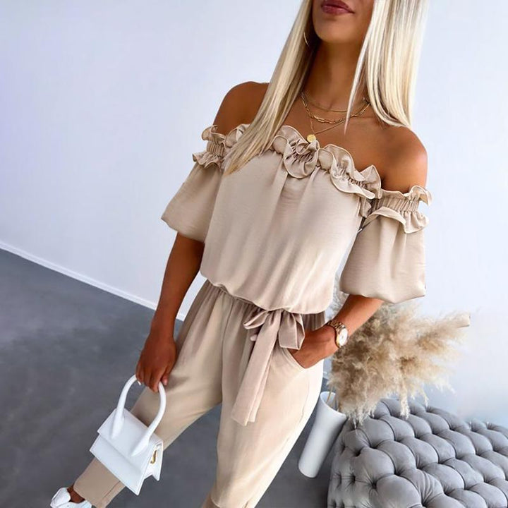 MIA – ROMANTIC JUMPSUIT WITH RUFFLES AND OFF-SHOULDER DESIGN